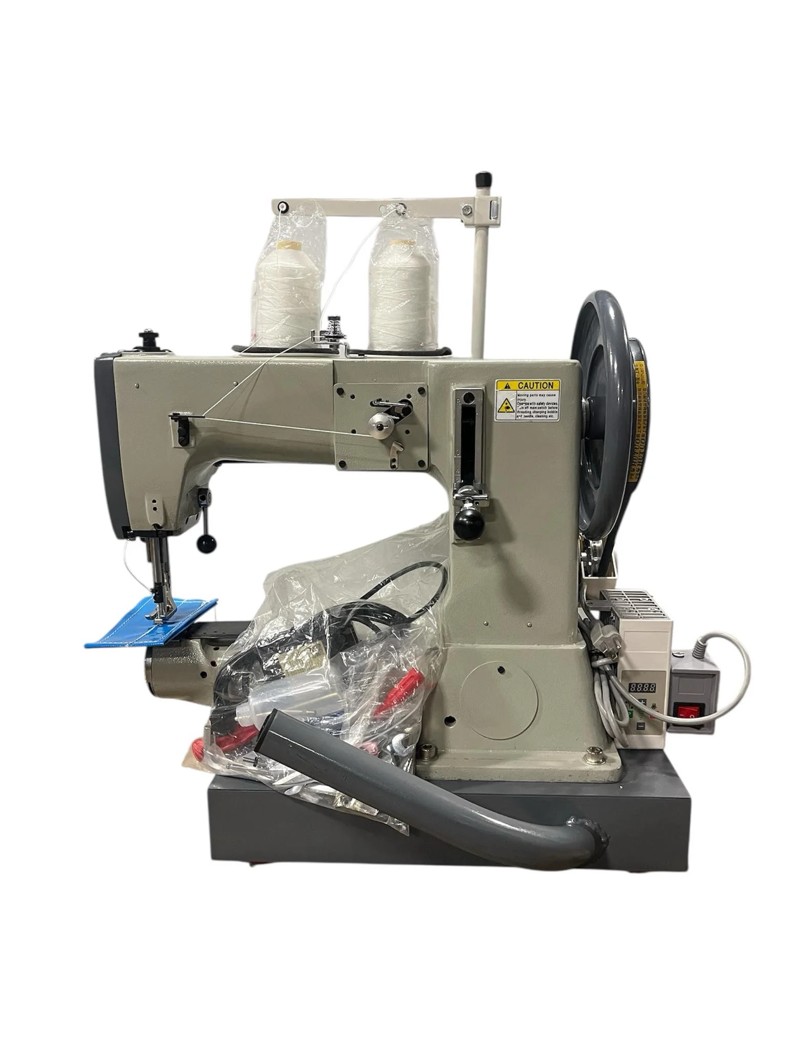 Side view of the portable walking-foot sewing machine used in FixMyInflatable's repair class